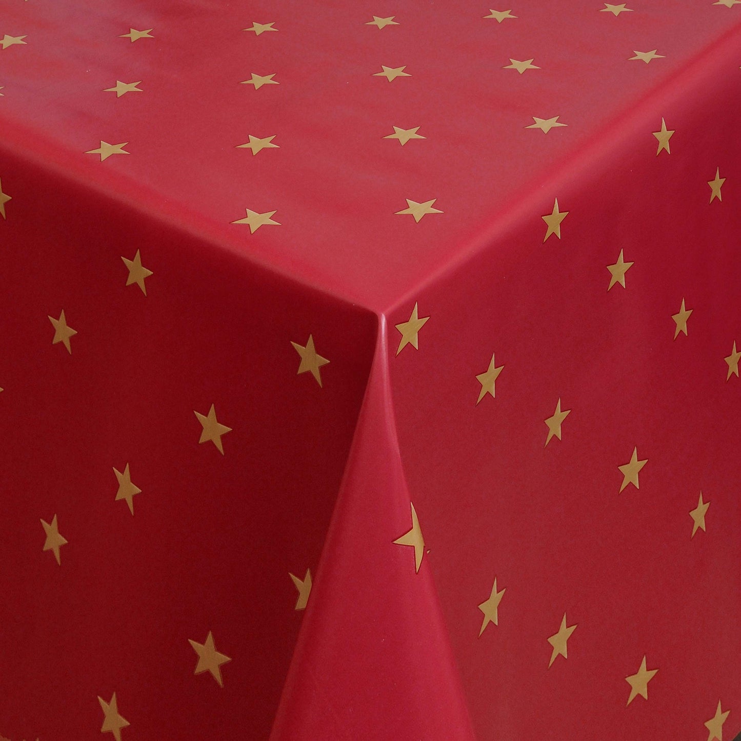 Oilcloth roll Christmas 01280-03 stars gold on red roll goods