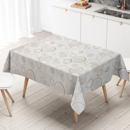 Moderne Wachstuch-Tischdecke mit abstraktem Kreismuster in Beige-, Grau- und Cremetönen auf heller Leinenoptik.