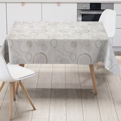 Moderne Wachstuch-Tischdecke mit abstraktem Kreismuster in Beige-, Grau- und Cremetönen auf heller Leinenoptik.