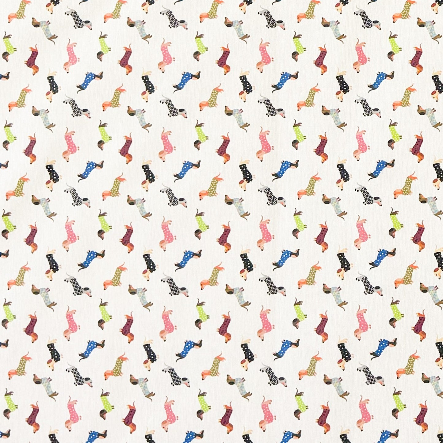 Jacquard Tischdecke aus beschichteter Baumwolle mit kleinem, buntem Dackel-Muster auf hellem Hintergrund, fleckenabweisend und pflegeleicht.