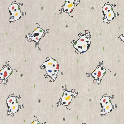 Jacquard-Tischdecke aus beschichteter Baumwolle in Natur mit buntem Kuhmotiv, fleckenabweisend.