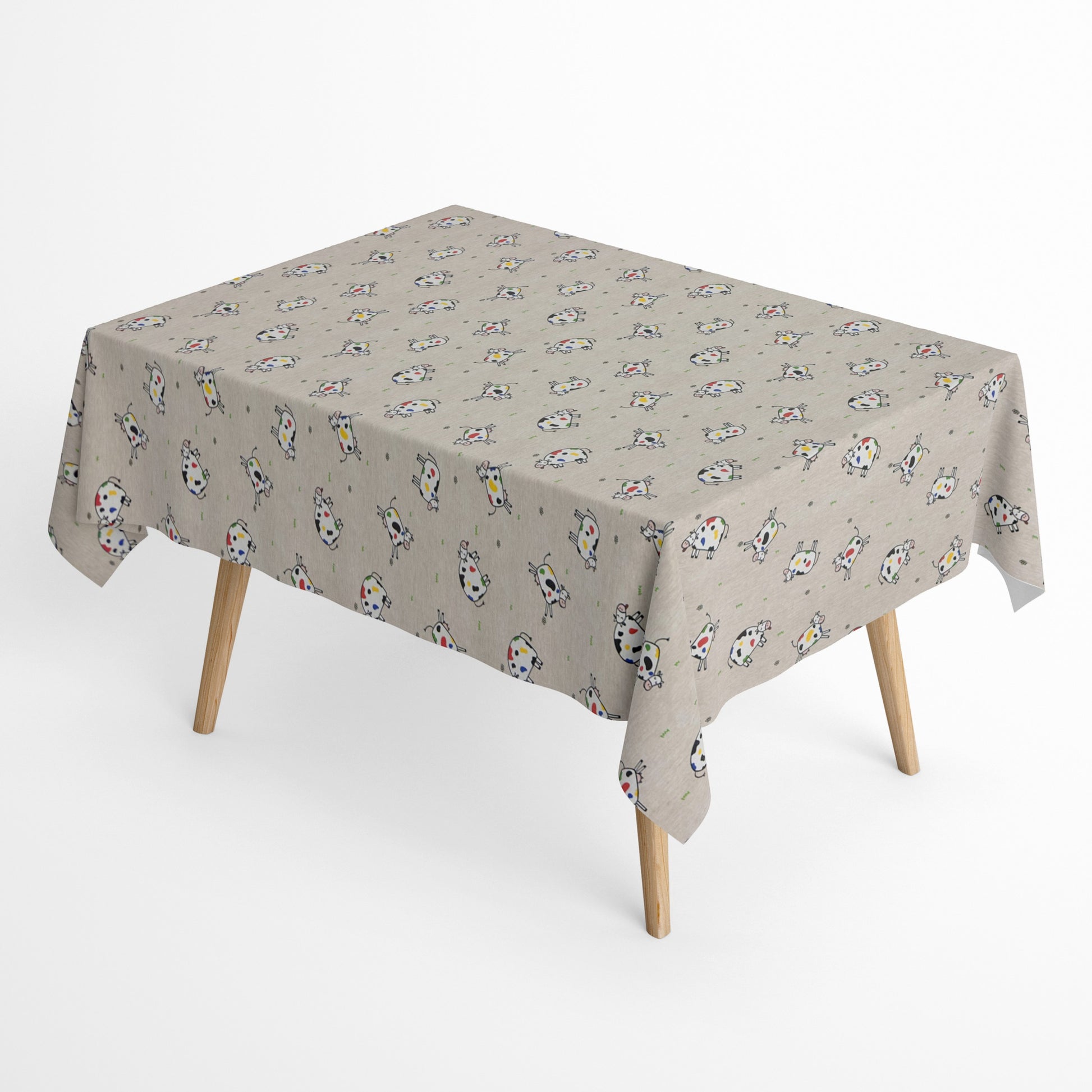 Jacquard-Tischdecke aus beschichteter Baumwolle in Natur mit buntem Kuhmotiv, fleckenabweisend.