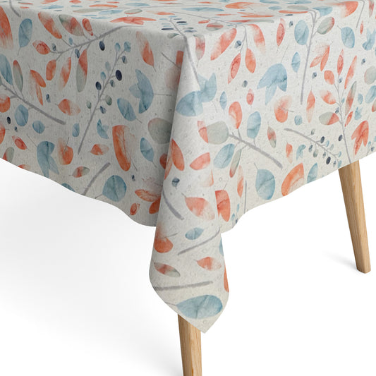 Beschichtete Jacquard-Baumwolltischdecke mit zartem Aquarell-Blättermuster in Koralle, Hellblau, Grau und Naturtönen, fleckengeschützt und schmutzabweisend.