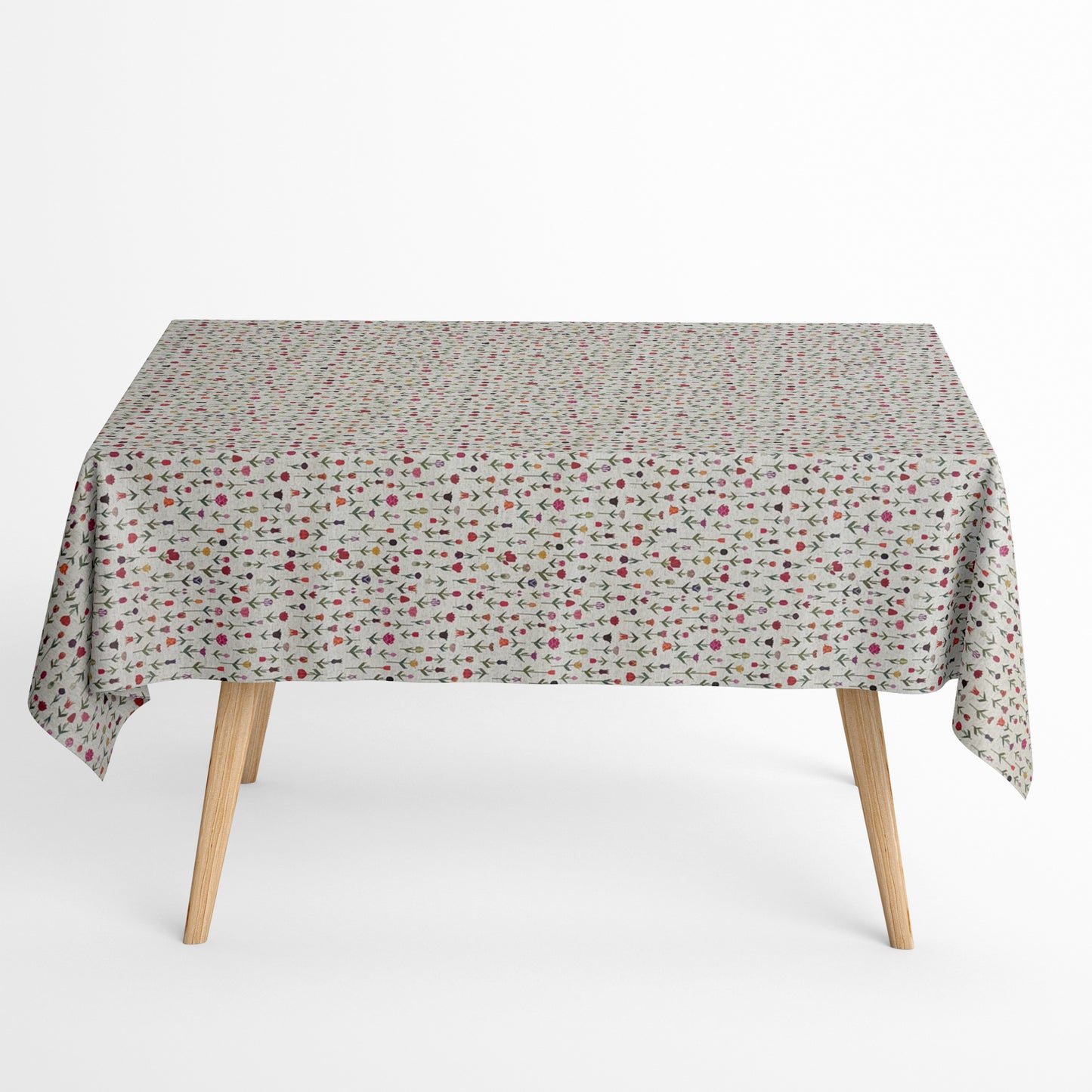 Beschichtete Jacquard-Baumwolltischdecke mit zartem Streublumenmuster aus kleinen bunten Blüten auf naturfarbenem Hintergrund, fleckengeschützt und schmutzabweisend.