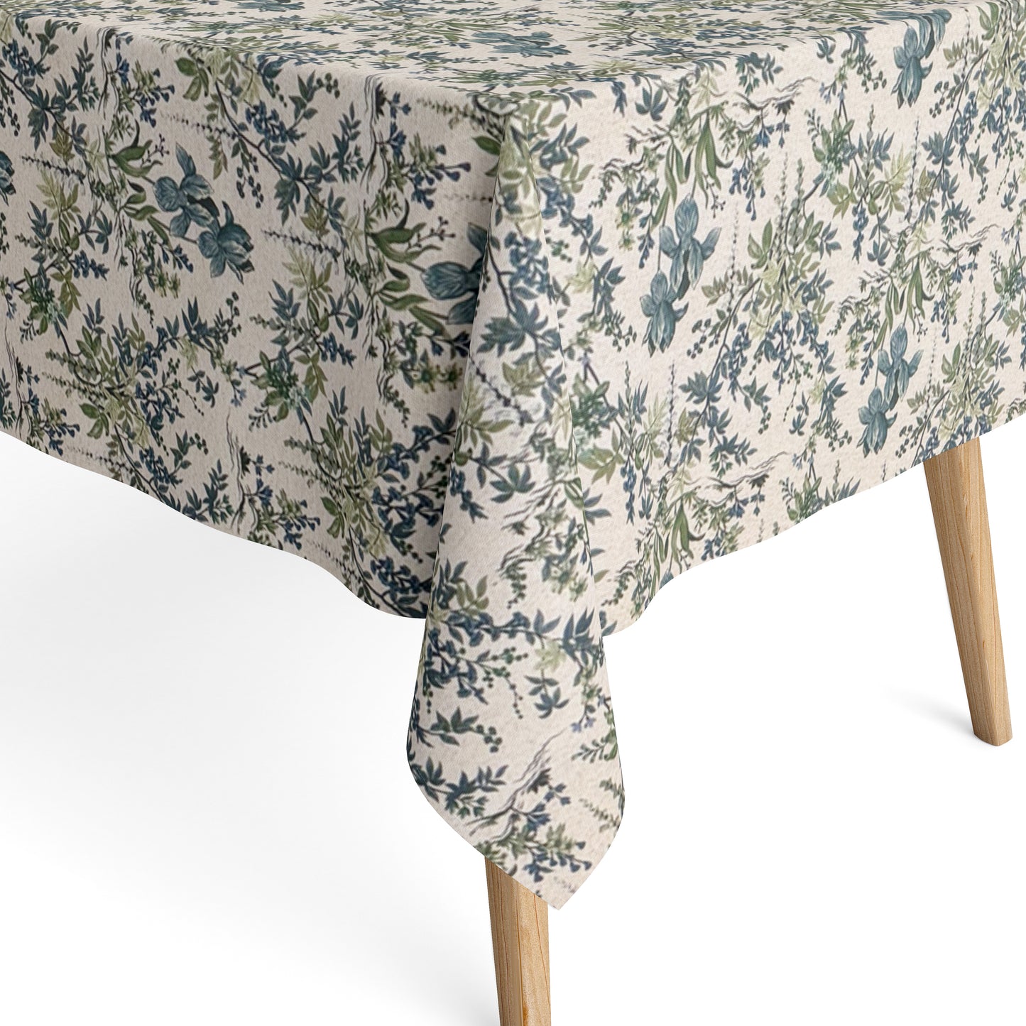 Beschichtete Jacquard-Baumwolltischdecke mit filigranem Blumen- und Blättermuster in Blau- und Grüntönen auf naturfarbenem Hintergrund, fleckengeschützt und schmutzabweisend.