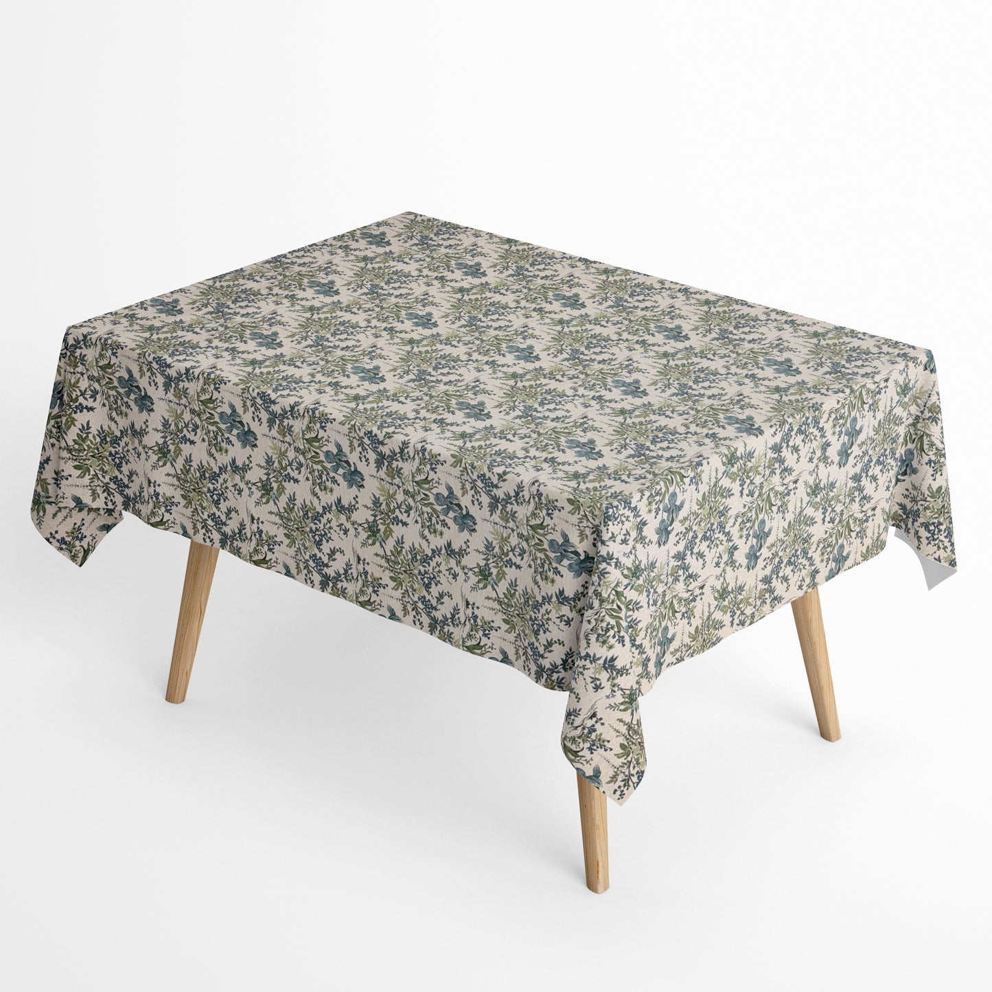Beschichtete Jacquard-Baumwolltischdecke mit filigranem Blumen- und Blättermuster in Blau- und Grüntönen auf naturfarbenem Hintergrund, fleckengeschützt und schmutzabweisend.
