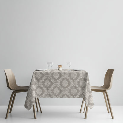 Rechteckige Tischdecke in Taupe aus beschichteter Baumwolle mit elegantem Jacquard-Damastmuster.