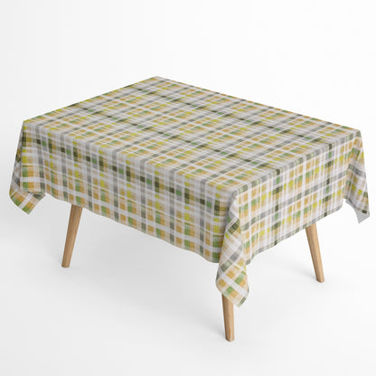 Jacquard Tischdecke aus beschichteter Baumwolle mit Karomuster in Grün-, Gelb- und Naturtönen, fleckenabweisend und pflegeleicht.