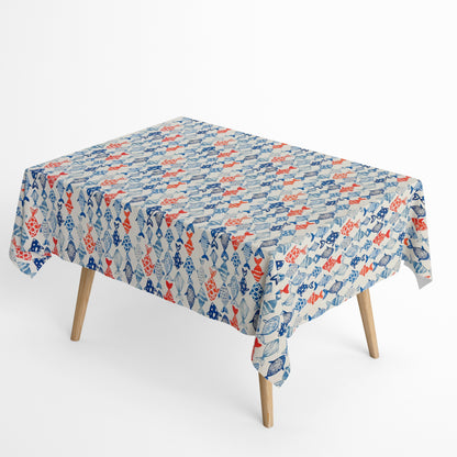 Jacquard Tischdecke aus beschichteter Baumwolle mit maritimem Fischmuster in Blau- und Rottönen auf hellem Hintergrund, fleckenabweisend und pflegeleicht.