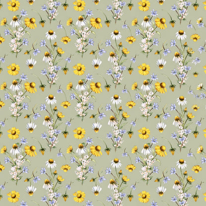 Wachstuch-Tischdecke mit Wiesenblumenmuster auf salbeigrünem Hintergrund. Gelbe Blüten, weiße Margeriten, kleine blaue Blumen und zarte weiße Blütenzweige sind gleichmäßig verteilt und sorgen für eine frische, natürliche Ausstrahlung.