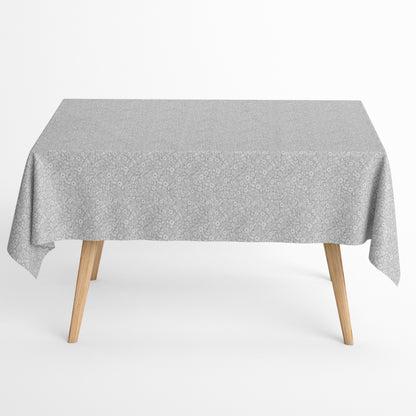 Jacquard Tischdecke aus beschichteter Baumwolle mit feinem Blumen- und Blütenmuster in Grau und Weiß, fleckenabweisend und pflegeleicht.