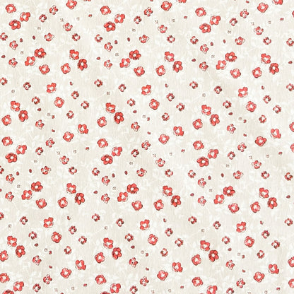 Die Jacquard Tischdecke aus beschichteter Baumwolle zeigt ein feines Streublumenmuster mit kleinen roten Blüten auf hellem, leicht strukturiertem Hintergrund.