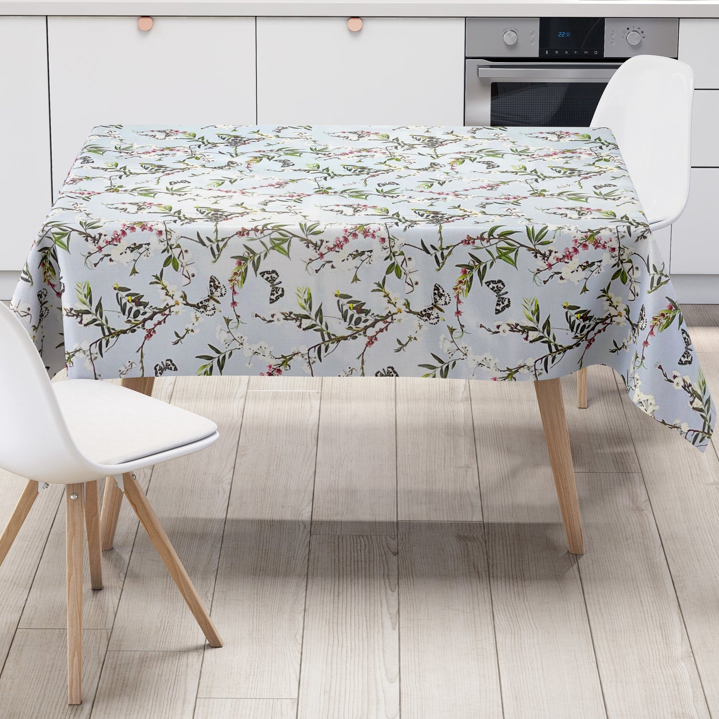Nappe en toile cirée K150206 fleurs colorées et papillons sur fond bleu clair carré rond ovale